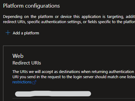 Snip of app registration interface where the admin can configure Web Redirect URIs, with a selection blanked out for privacy.